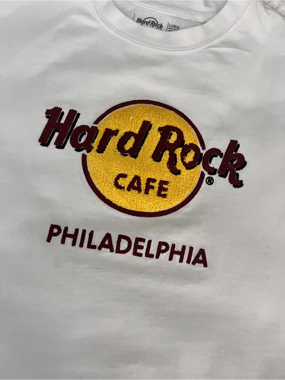 Vintage Hard Rock Cafe White Tee with Yellow Circle and Maroon Lettering patch